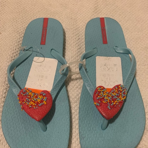Grendene Other - Blue Flip Flops with Red Heart Accents